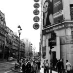 grayscale photo of people walking on street