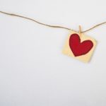 heart-shaped red and beige pendant